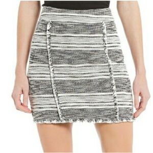1. State mini tweed fringe skirt
